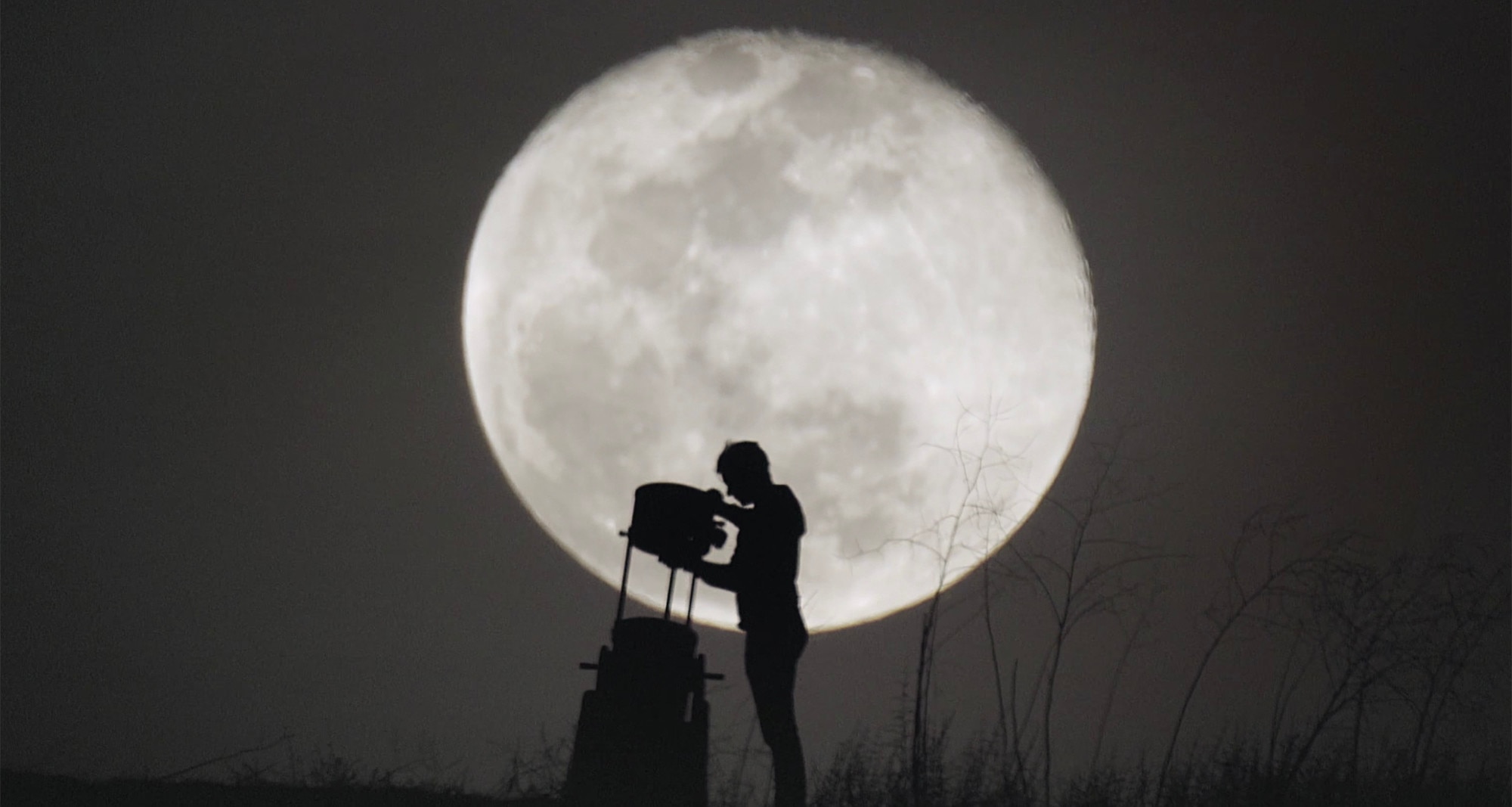 Wylie Overstreet shuts down his telescope after viewing the Moon. Credit: Wylie Overstreet and Alex Gorosh