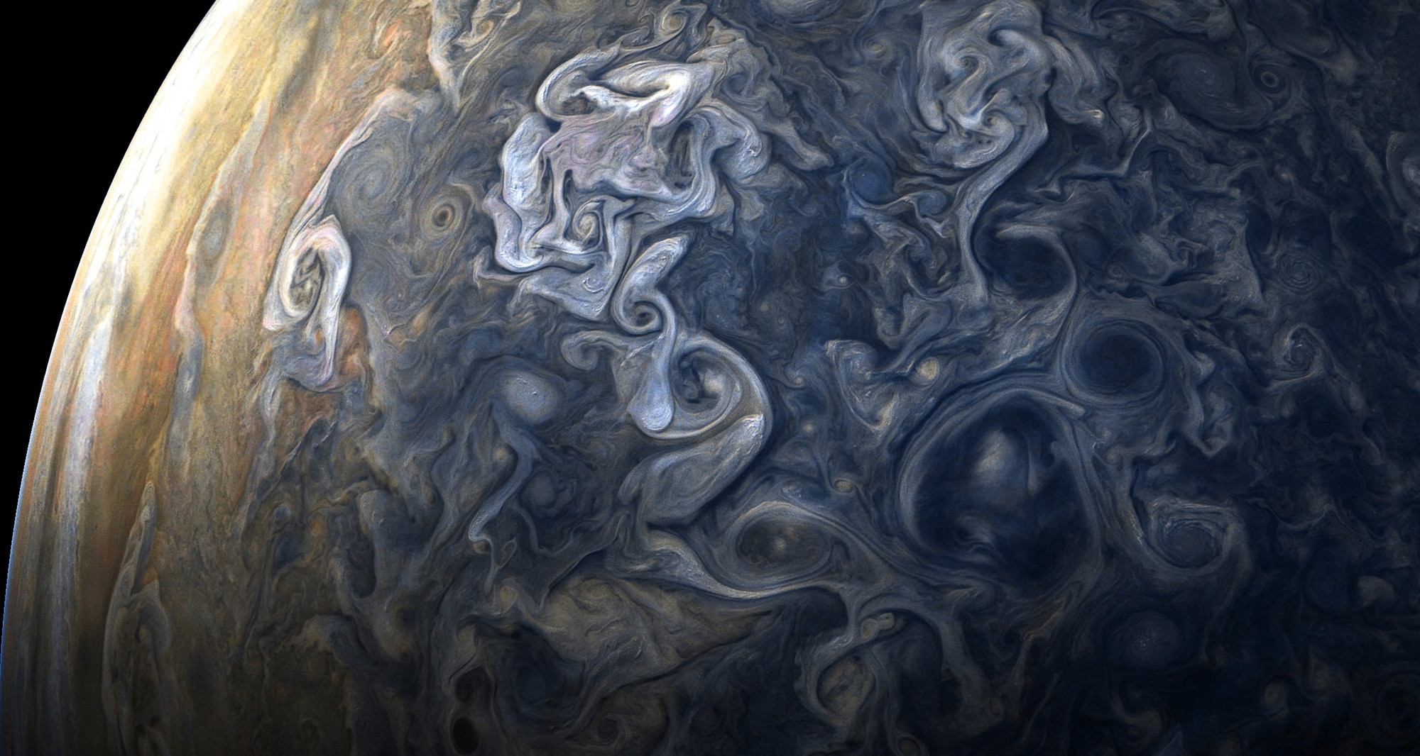 High-latitude clouds swirl and rage in this image taken from 19,000 km above Jupiter’s northern latitudes. Credit: NASA / SwRI / MSSS / Gerald Eichstädt / Seán Doran