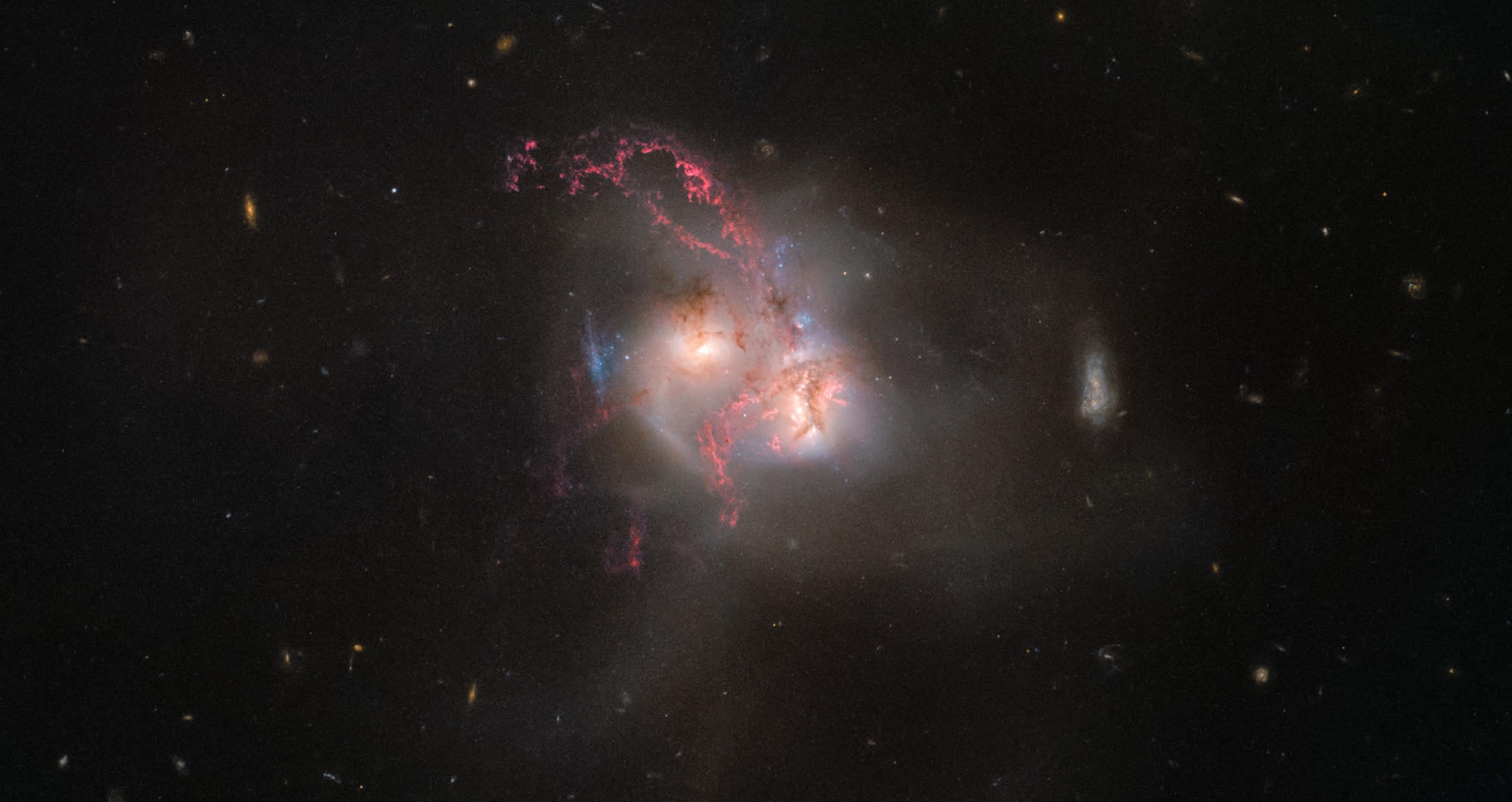 NGC 5256, a pair of colliding galaxies 350 million light years away. Credit: ESA/Hubble, NASA