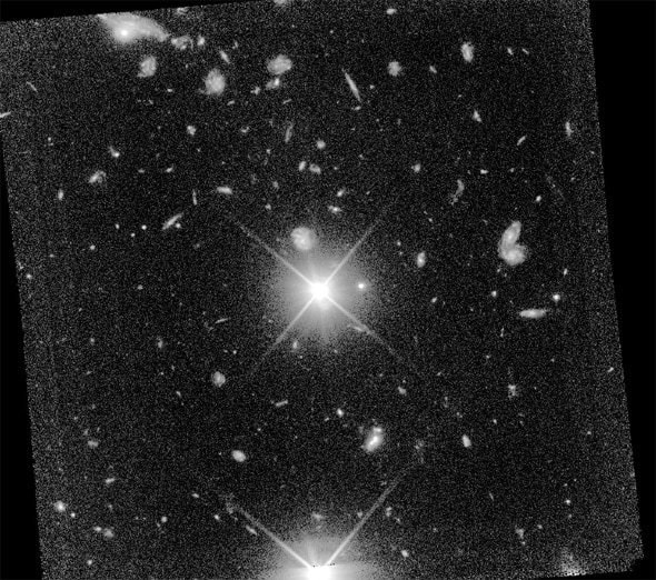 The Hubble Deep Field South image, taken by STIS. Almost everything you see there is a galaxy; the bright object in the middle is a quasar more than 10 billion light-years away. Credit: Gardner et al.