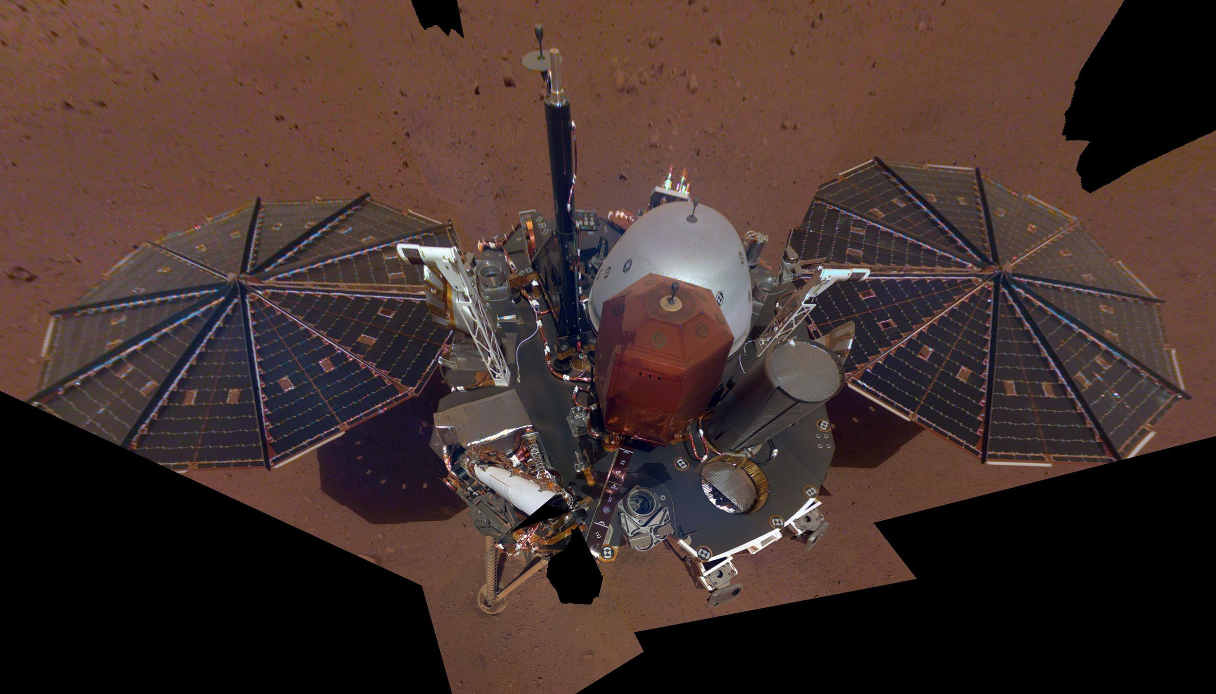 A “selfie” of the Mars InSight lander, using 11 images taken by a camera mounted on a mobile robotic arm. Credit: NASA/JPL-Caltech 