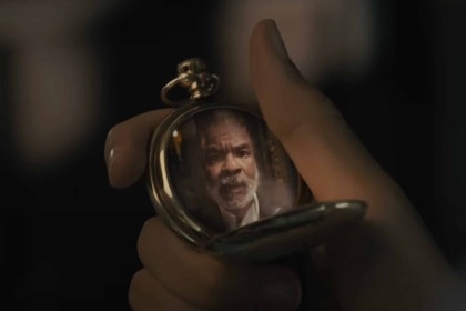 Roger (David Alan Grier) appears within a pocketwatch in The American Society of Magical Negroes (2024).