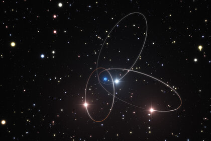 Artwork depicting three stars and their orbits around Sgr A*, the supermassive black hole in the center of the Milky Way. Credit: ESO/M. Parsa/L. Calçada