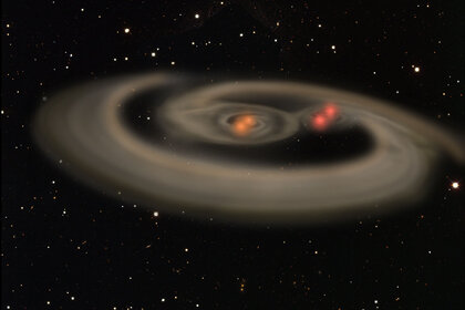 Artwork depicting the birth of a quadruple star system similar to CzeV1640, with two binary systems in turn orbiting each other. Credit: Institute of Astronomy / University of Hawaii