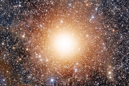 Cropped part of the full-resolution image of Betelgeuse shows countless stars as well as a miasma of gas and dust in the background. Credit: Adam Block /Steward Observatory/University of Arizona 