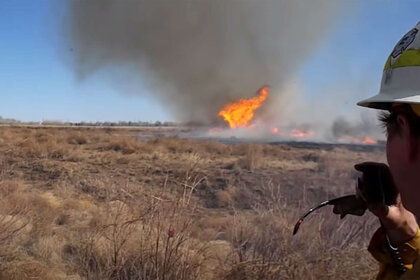A fire tornado (really a fire dust devil) forms during a proscribed burn in Denver, Colorado in 2014. Credit: Thomas Rogers, from the video