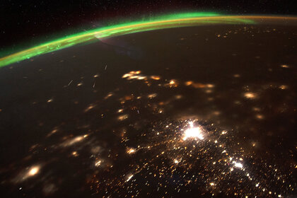 A composite photo (made up of several individual pictures) of Quadrantid meteors burning up over Earth, taken from the International Space Station on 4 January, 2020. The green glow of the aurora borealis is seen to the north. Credit: NASA