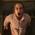 Abigail (Alisha Weir) demonically screams with sharp teeth in Abigail (2024) .