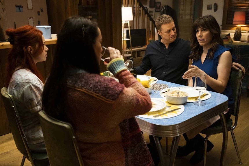 D'arcy, Asta, Harry, and Heather eat a meal together in Resident Alien Episode 305.