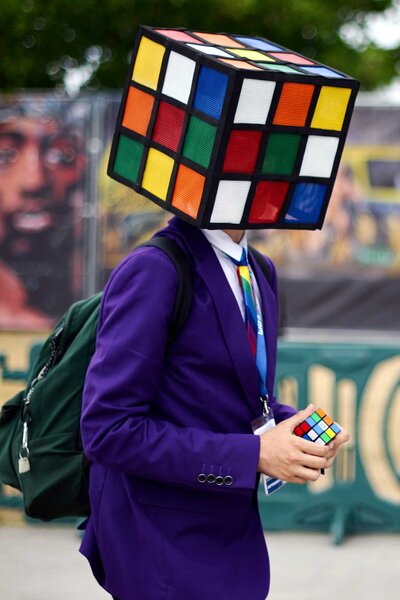 A Rubik's cube cosplayer at SDCC 2023