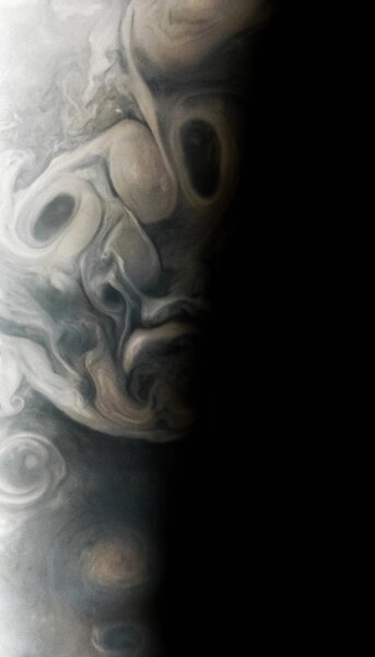 A sad face made of storm clouds on Jupiter.