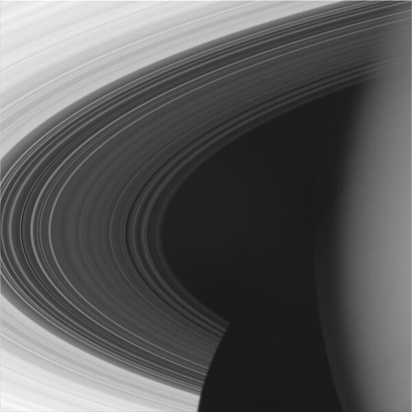 Cassini took this shot of Saturn (right), the C ring (dark grey) and brighter B ring from a distance of 627,000 kilometers on Sept. 4, 2005. Credit: NASA/JPL/Space Science Institute