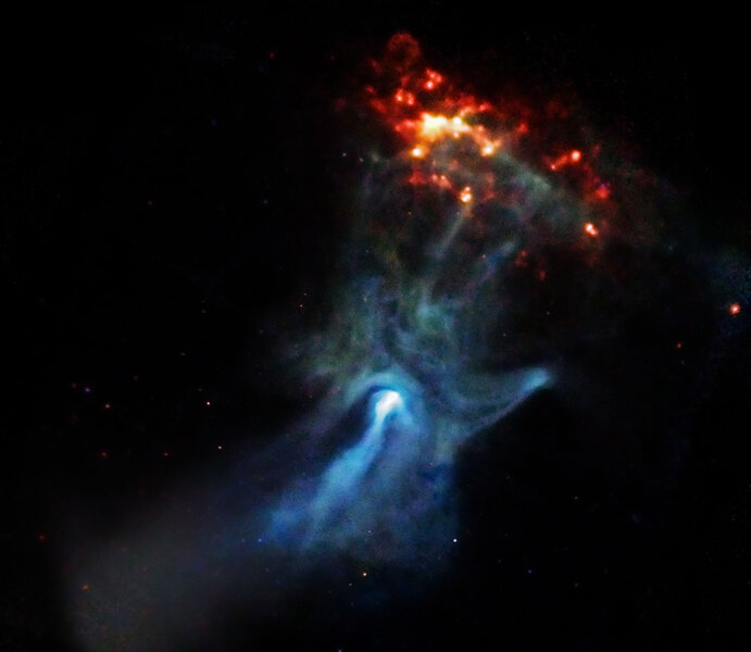 The gas surrounding the young neutron star B1509-58 looks like a cosmic hand reaching for another cloud. Credit: NASA/CXC/SAO/P. Slane, et al.