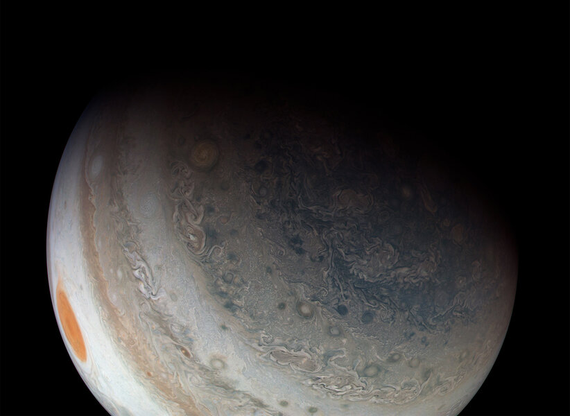 The southern hemisphere of Jupiter goes from orderly to chaotic closer to the pole. Note the Great Red Spot on the left, tens of thousands of kilometers away. Credit: NASA / SwRI / MSSS / Seán Doran