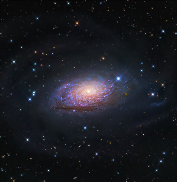 M63, the Sunflower Galaxy, imaged using three different telescopes to get crisp views of both the inner and outer structures. Credit: Robert Gendler, Roberto Colombari,Don Goldman, NAOJ, Hubble Legacy Archive