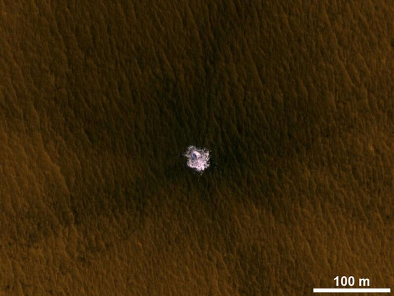 In 2012, the Mars Reconnaissance Orbiter saw a fresh impact crater in the mid-latitudes of Mars that excavated ice from just under the surface. Credit: NASA/JPL-Caltech/Univ. of Arizona
