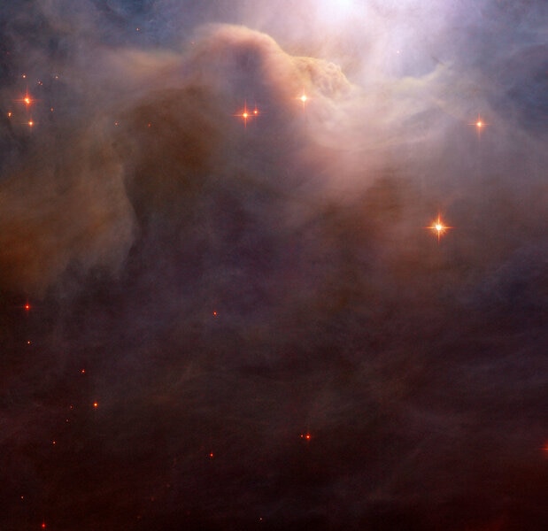 A close-up of the Iris Nebula using Hubble, showing the details in the dust cloud. Credit: NASA and ESA