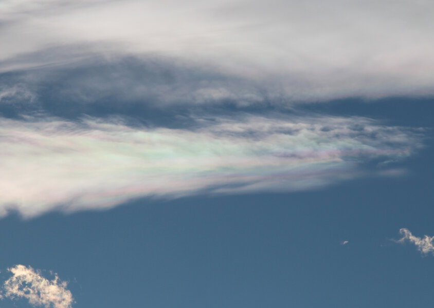 Pink and green colors in a cloud due to iridescence. Credit: Phil Plait