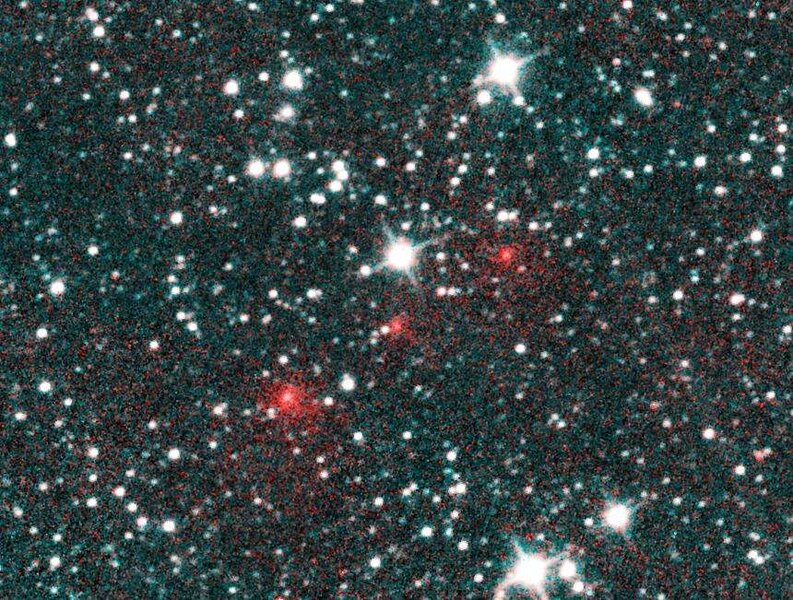 A composite of the three discovery images of comet C/2020 F3 (NEOWISE) taken from NASA’s NEOWISE spacecraft. The comet’s motion (red) makes it stand out from background stars. Credit: NASA/JPL-Caltech