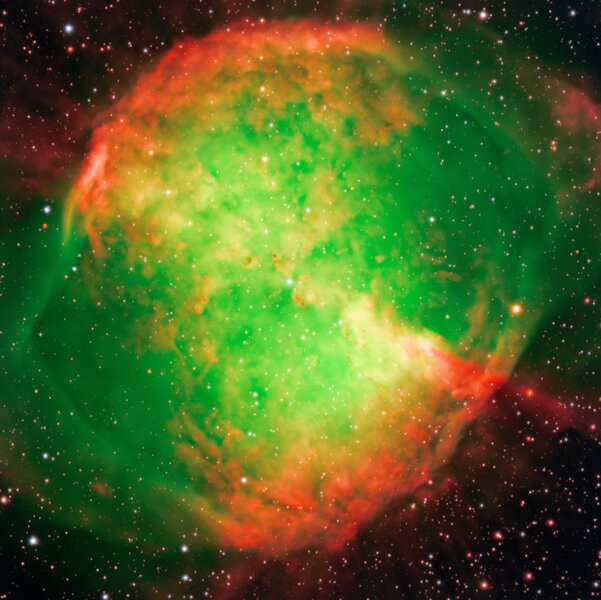 The spectacular Dumbbell Nebula, a dying star that has cast off its outer layers which now glow. Credit: ESO/I. Appenzeller, W. Seifert, O. Stahl