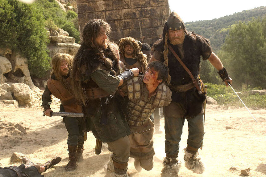 Rupert Friend is dragged by men in The Last Legion (2007)