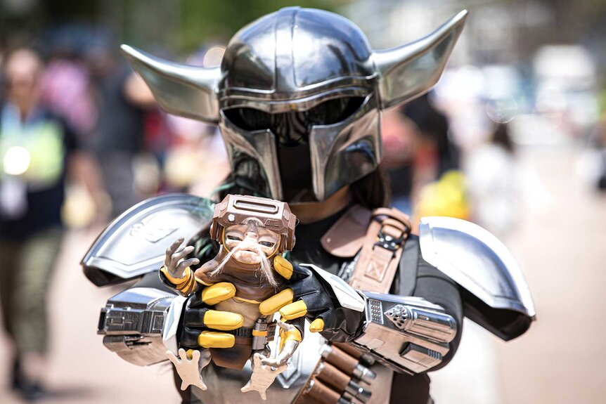 A cosplayer dressed as Grogulorian at San Diego Comic-Con Day 3