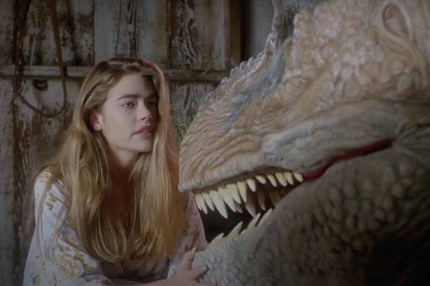 Tammy (Denise Richards) talks to a T-Rex in Tammy and the T-Rex (1994).