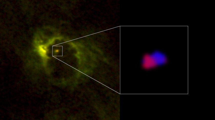 The inner two rings of gas and dust of M77 are clearly seen by ALMA. Material in the inner ring shown in red is moving away from us (redshifted) as it moves around the central black hole, and blue is material moving toward us. Credit: ALMA (ESO/NAOJ/NRAO)