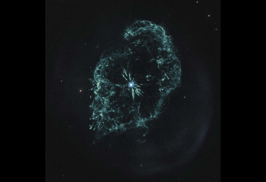 A Hubble image of the planetary nebula Abell 78 showing it in the light of oxygen, which highlights the filaments and blobs of gas speeding away from the central star. Credit: ESA/Hubble & NASA / M. Guerrero / processed by Judy Schmidt