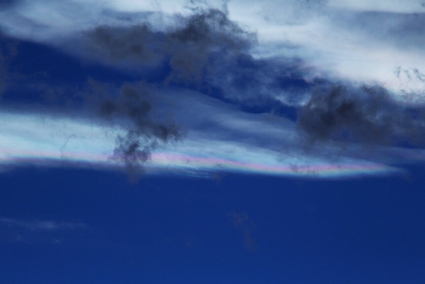 Iridescent clouds over Boulder, with the contrast enhanced to show the colors. Credit: Phil Plait