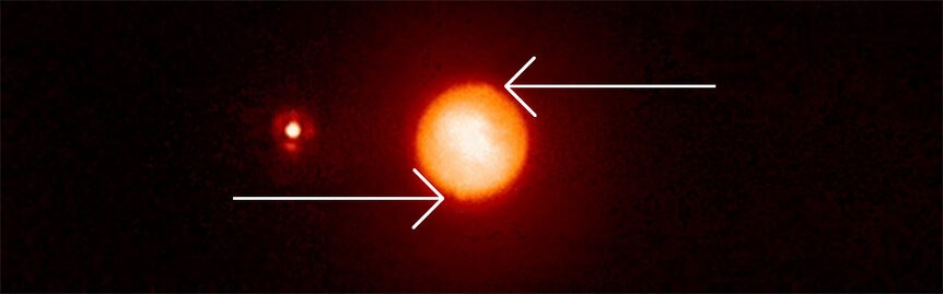 During the second star's transit, two refraction spots appear on opposite sides of Titan. Credit: Bouchez et al.
