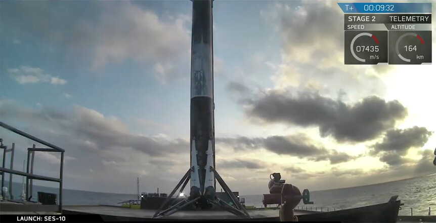 SpaceX reused Falcon 9 booster sits on the floating drone ship in the Atlantic