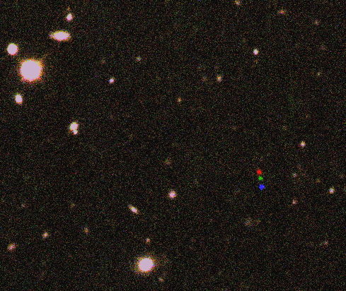 The discovery image of 2012 VP113; its motion makes it appear to be different colors as different filters were used.