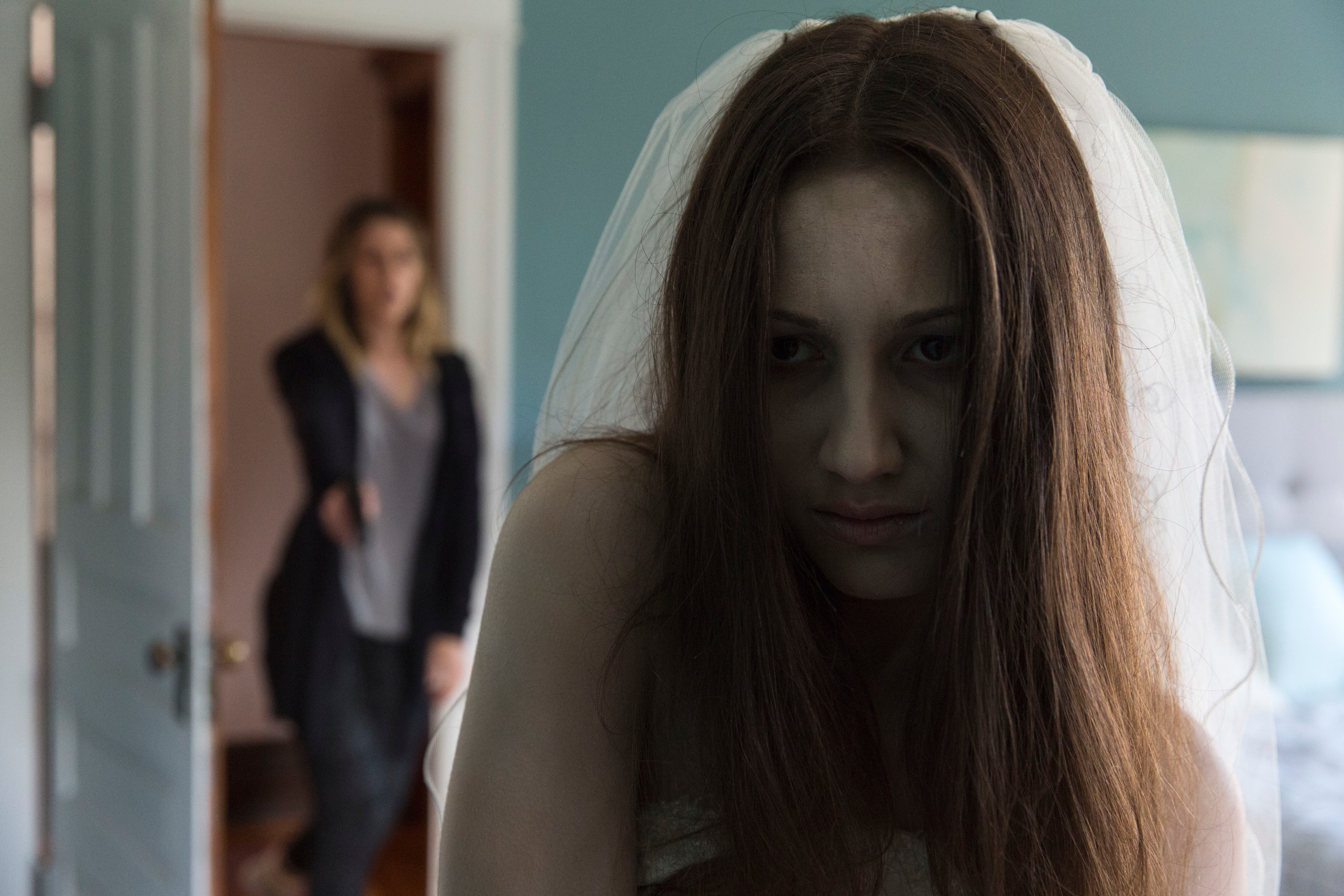 Zoe Belkin as a ghost in horror movie Isabelle