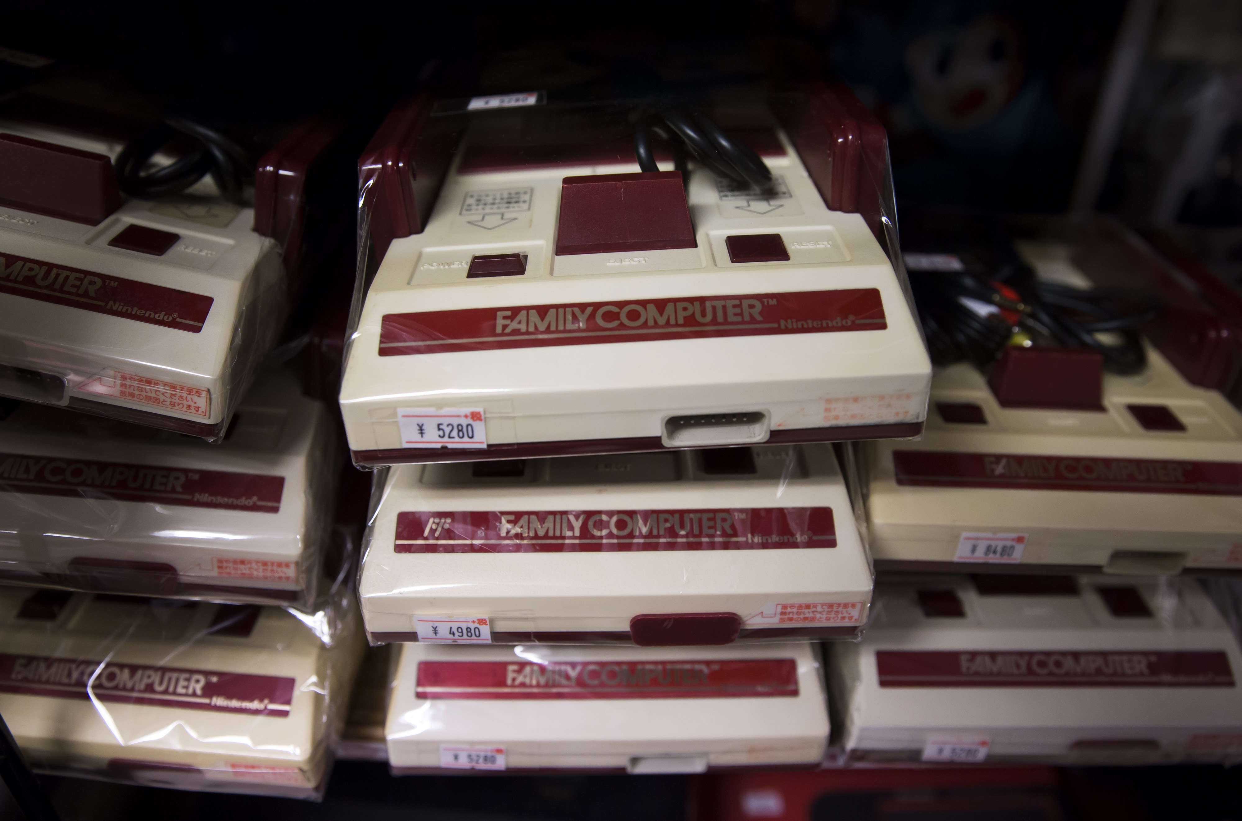 A stack of Nintendo Famicom consoles