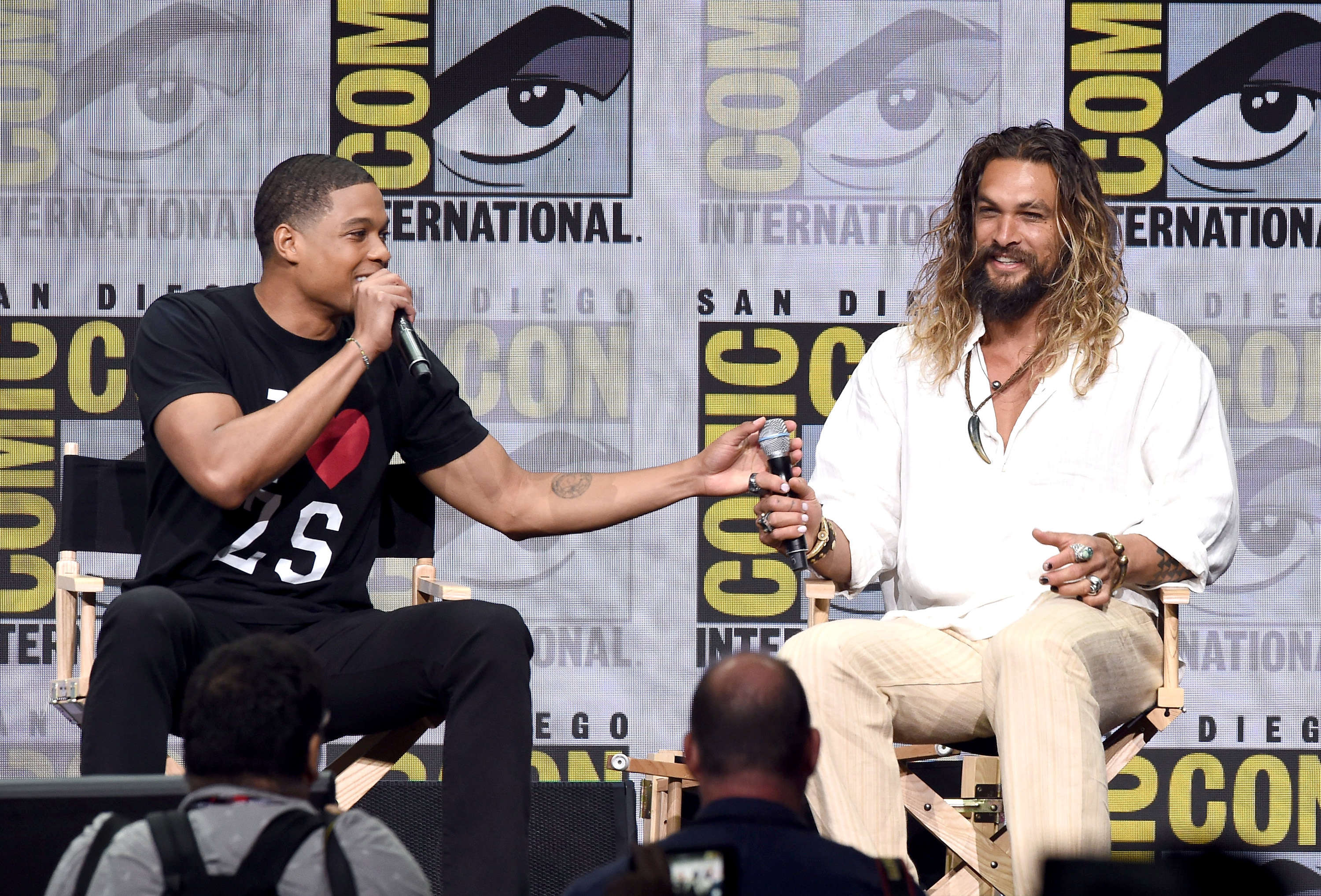 Ray Fisher and Jason Momoa at the Justice League Presentation at San Diego Comic Con in 2017