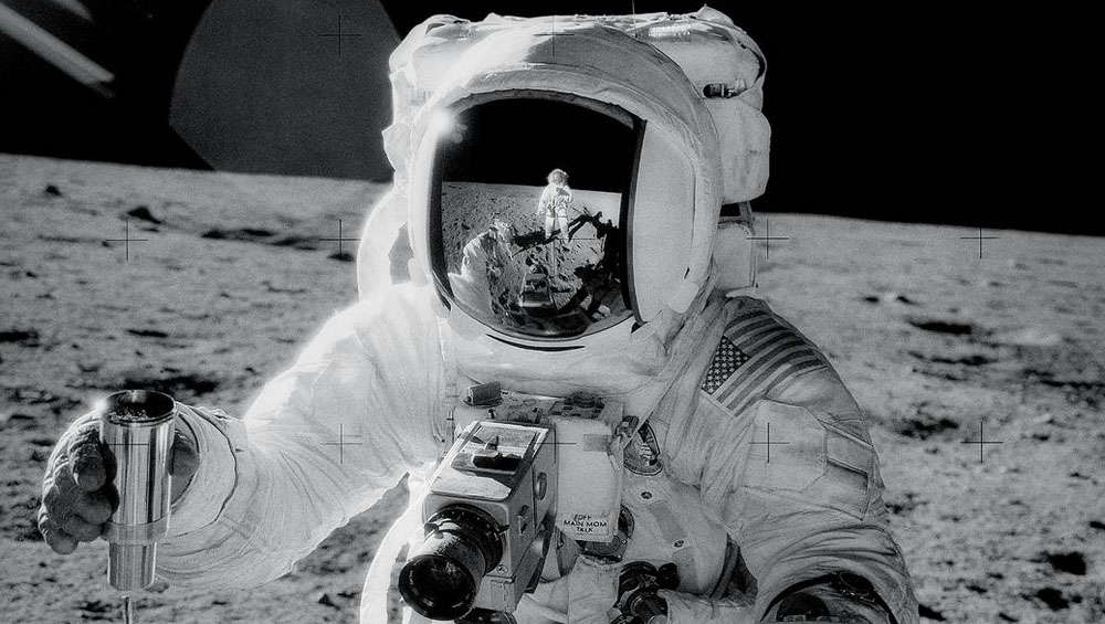 Apollo astronaut with sample