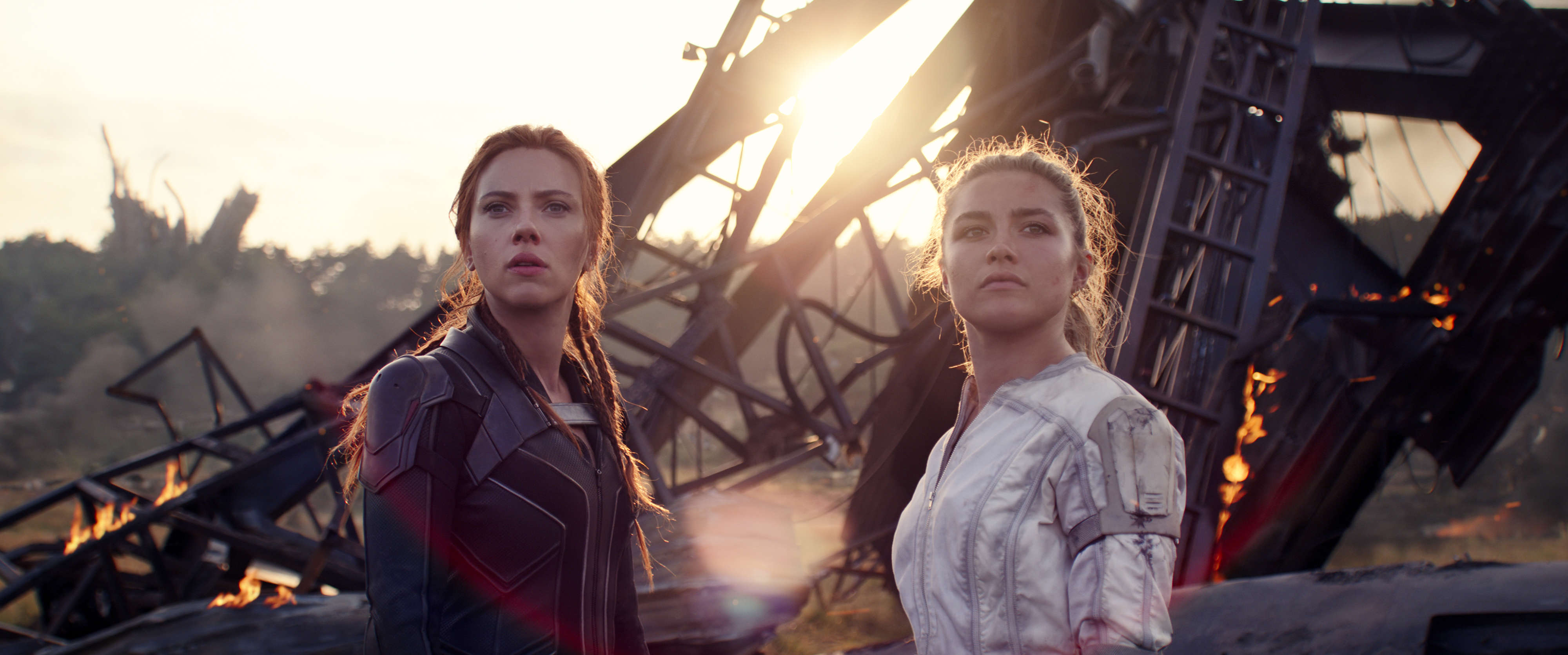 Natasha Romanoff/Black Widow (Scarlett Johansson) left and Yelena Belova (Florence Pugh) right in Marvel's "Black Widow" (2021)