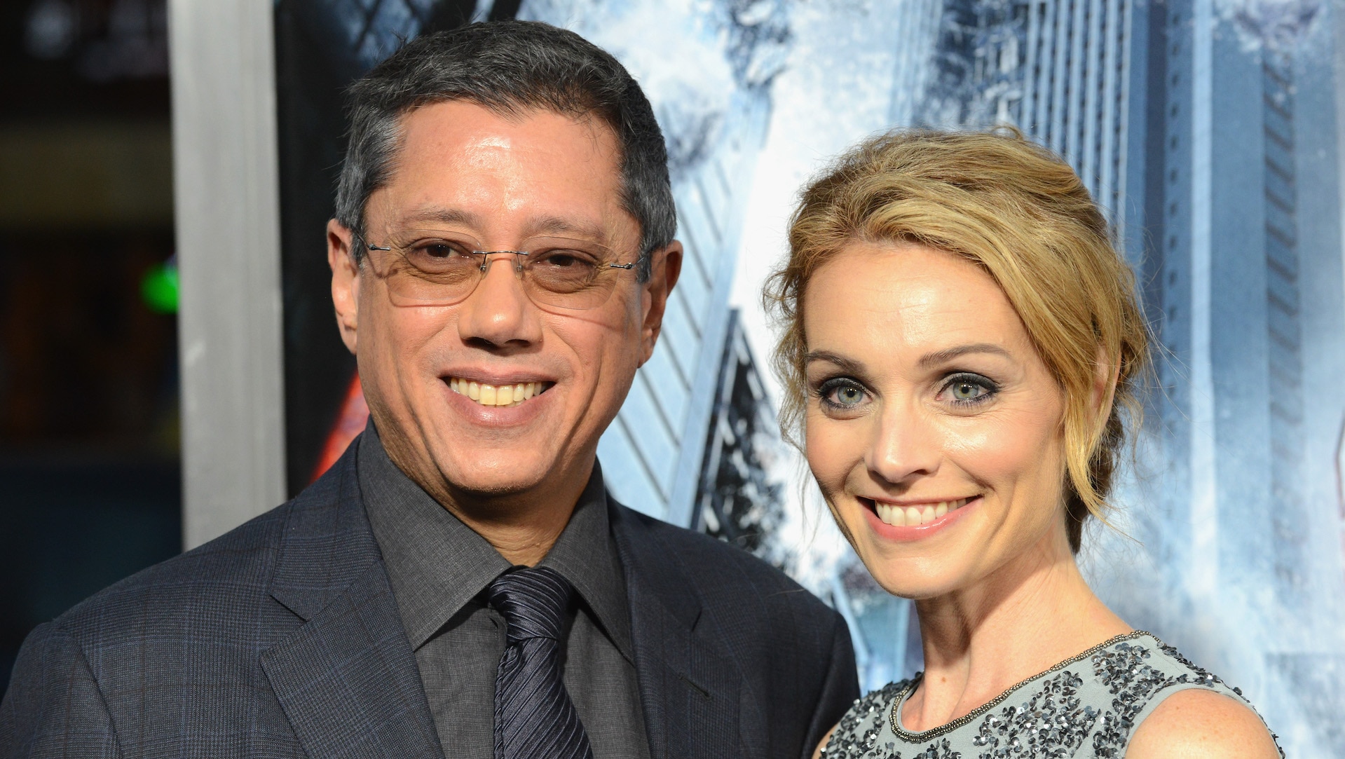 (L-R) Director Dean Devlin and wife/actress Lisa Brenner
