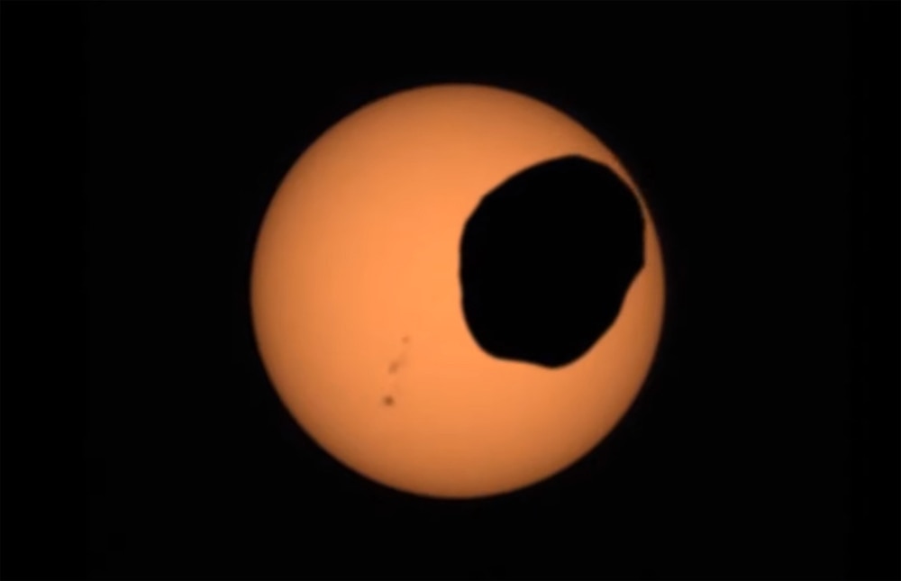 The Moon Phobos passing in front of the Sun.