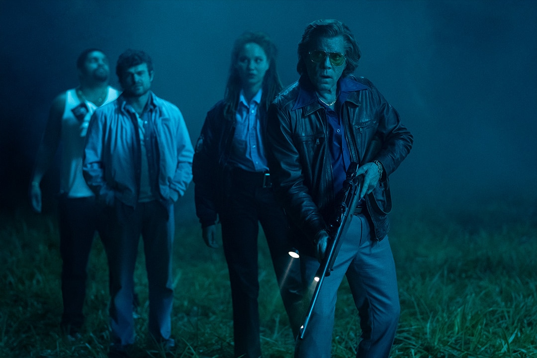(from left) Daveed (O’Shea Jackson, Jr.), Eddie (Alden Ehrenreich), Officer Reba (Ayoola Smart) and Syd (Ray Liotta) in Cocaine Bear (2022)
