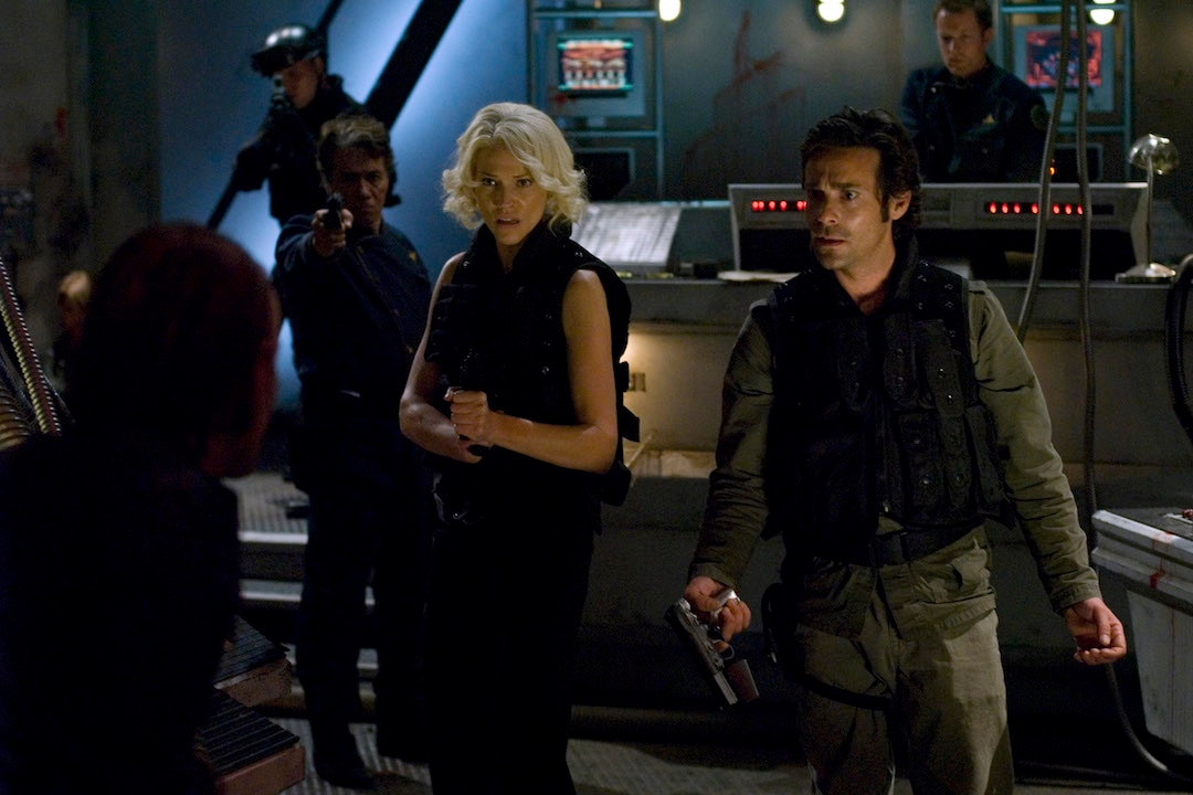 Tricia Helfer and James Callis in Battlestar Galactica finale.