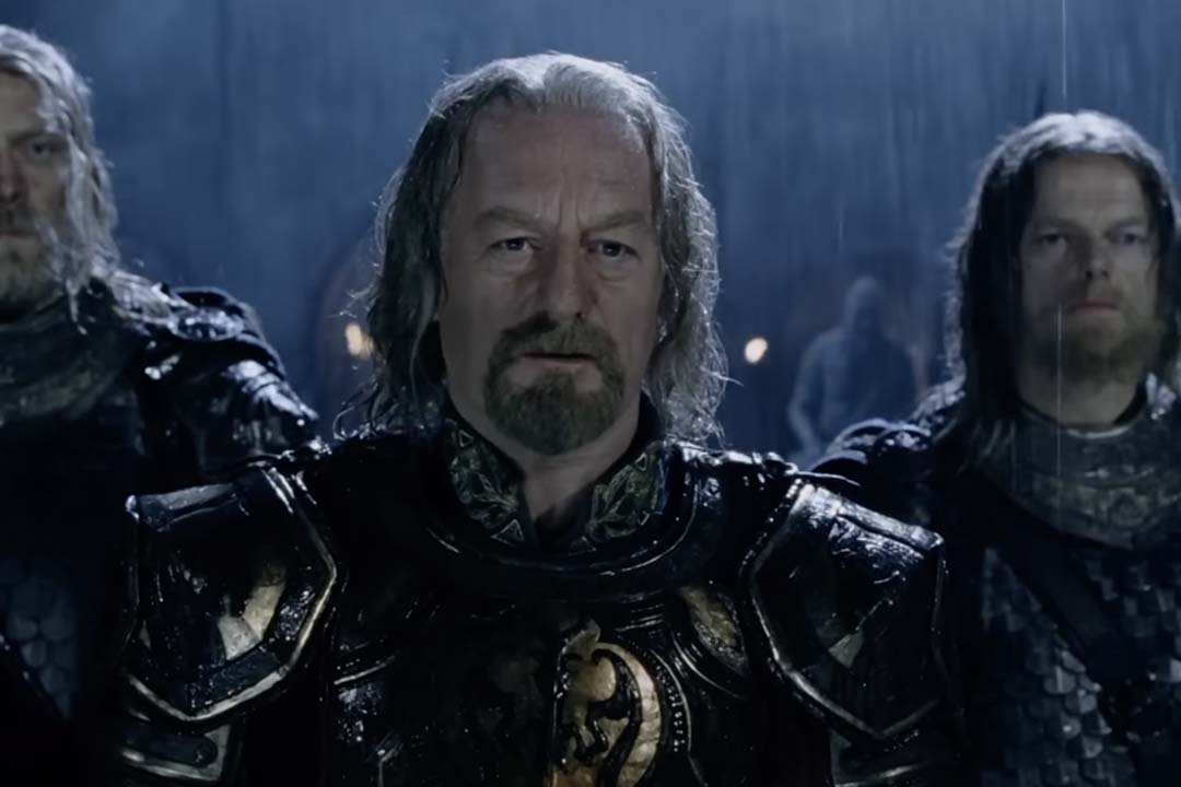 Théoden (Bernard Hill) appears in armor in the rain in Lord of the Rings: The Two Towers (2002).