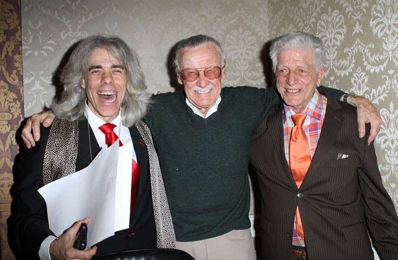 Mike Carbonaro, (left) with Stan Lee (center), has been buying and selling on the comic book convention circuit since the 1980s. [Courtesy Photo/ Mike Carbonara]