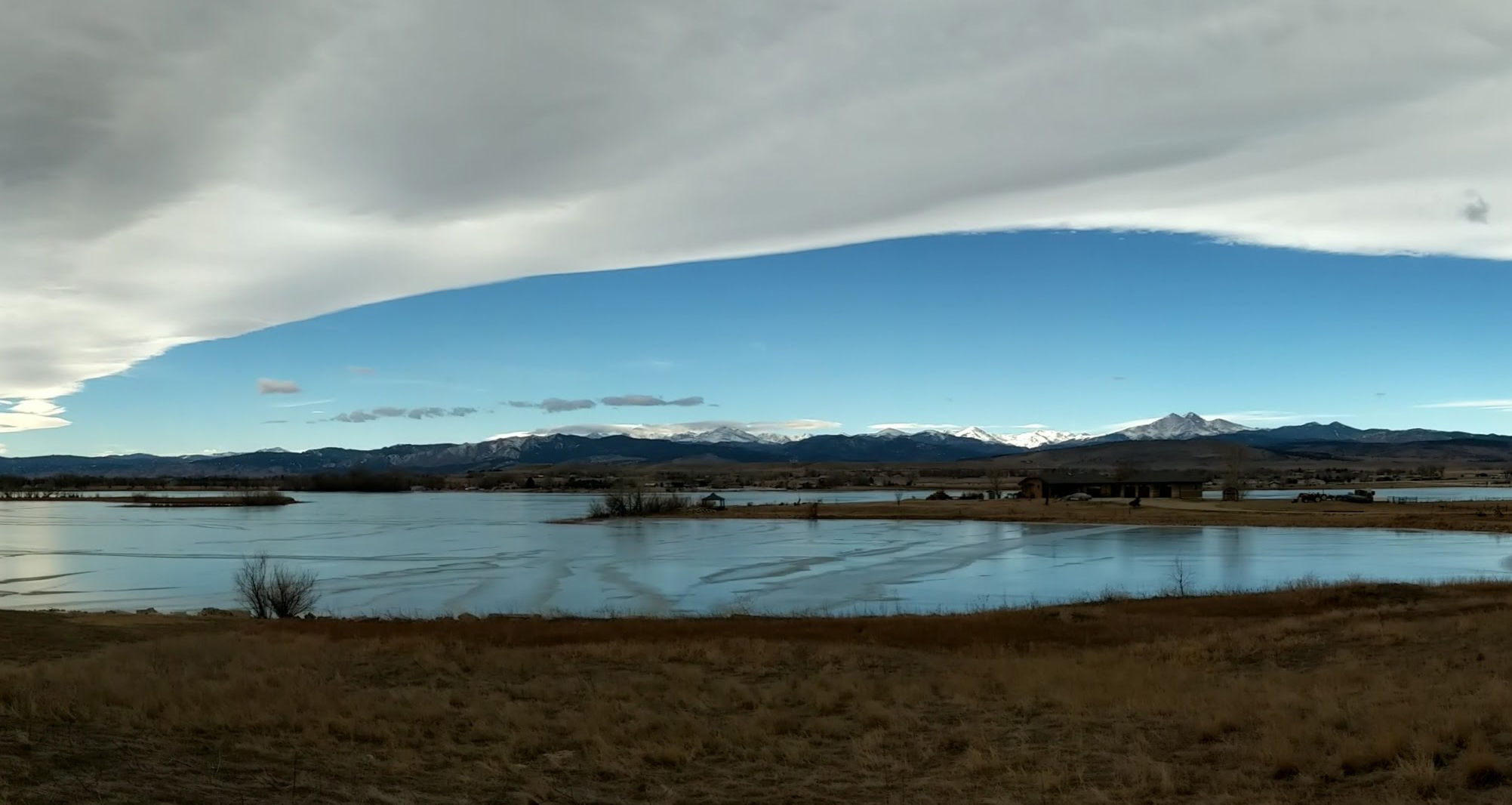 A Chinook Arch, a meteorological phenomenon where rising air over mountains forms a linear cloud edge, can be commonly seen in Colorado. Credit: Phil Plait