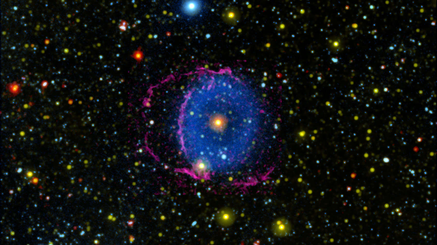 GALEX ultraviolet observations of the Blue Ring Nebula (in blue) together with ground-based observations in visible light (pink) finally reveal the true nature of this object: Two stars that merged into one, blowing out a wind shaped like two thick conica