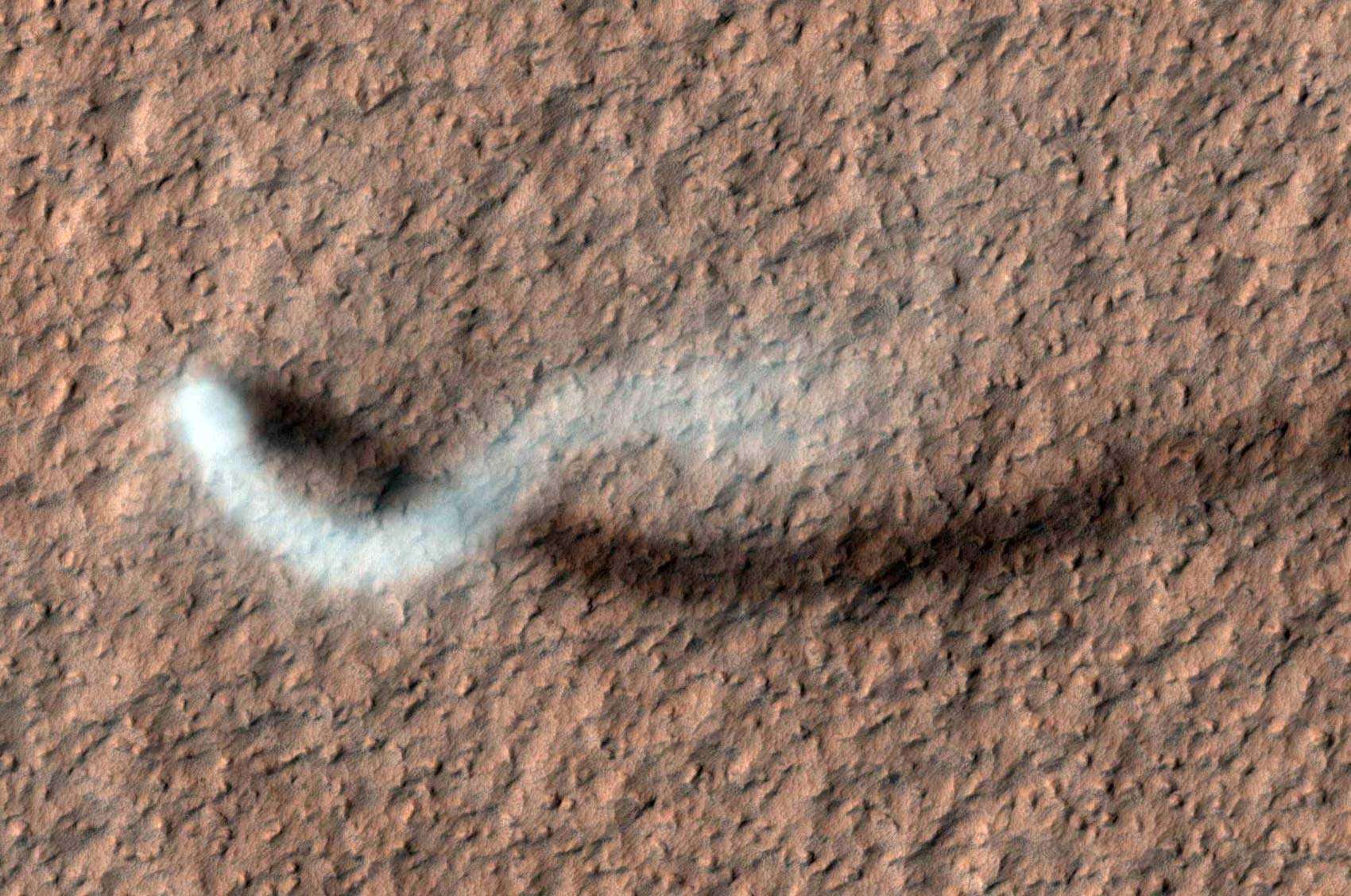 A towering dust devil on Mars seen from orbit. The plume was 30 meters wide and 800 meters high. Credit: NASA/JPL-Caltech/University of Arizona