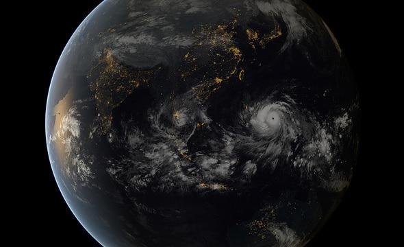 The typhoon Haiyan looks almost serene from a distance of tens of thousands of kilometers... but don't be fooled. Credit: Japan Meteorological Agency and EUMETSAT