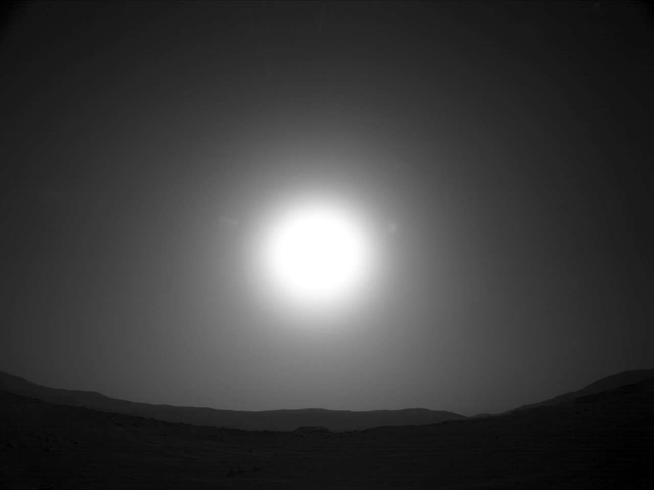 The Sun sets over Jezero crater as seen by the Mars rover Perseverance on Sol 4, the fifth Martian day after it landed (landing day is Sol 0; Sol 4 was February 23, 2021). Credit: NASA/JPL-Caltech