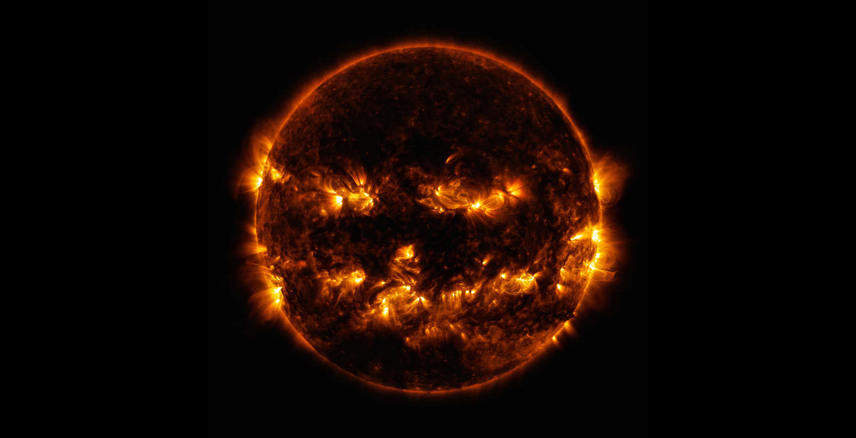 The Sun as seen by the Solar Dynamics Observatory in extreme ultraviolet (17.1 and 19.3 nanometers) makes it look like a pumpkin; magnetic activity was near its peak at the time. Credit: NASA/GSFC/SDO